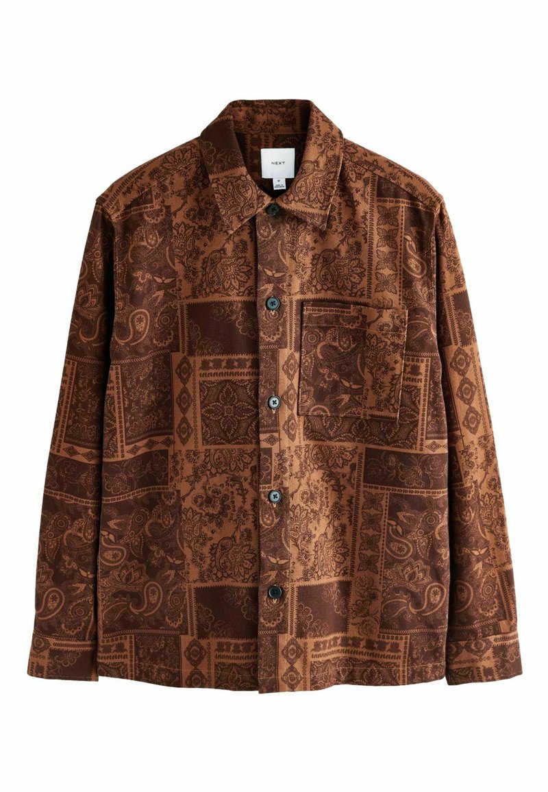 Brown patterned shirt featuring intricate designs, a collared neck, long sleeves, and a chest pocket. Fastened with dark buttons.