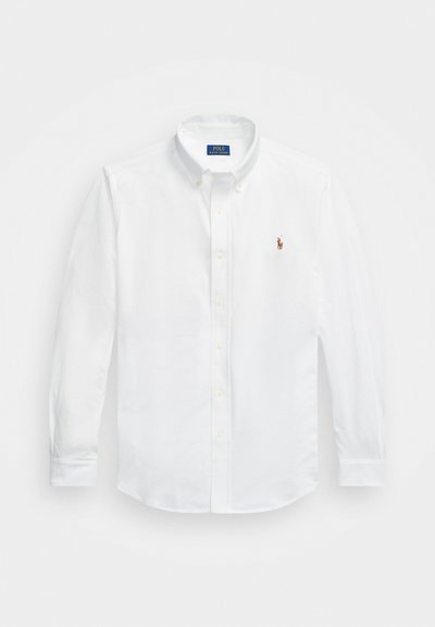 White long-sleeve button-up shirt, cotton fabric, classic collar, features a small embroidered horse logo on the left chest.