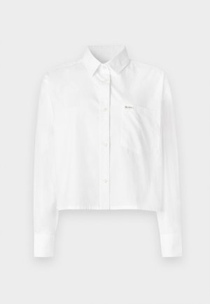 Witte cropped blouse met knoopjes, lange mouwen, voorzien van een kraag en een borstzak. Gemaakt van gladde stof zonder patronen.