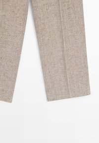 Beige linen pants with a straight cut leg and subtle texture laid flat against a white background.