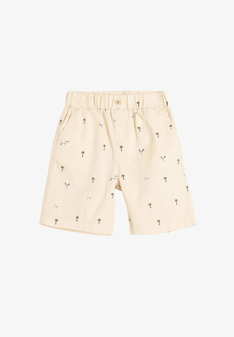 Beige Shorts mit einem elastischen Bund, die kleine gestickte Palmen und Vögel in Grün, Weiß und Orange im gesamten Stoff zeigen.