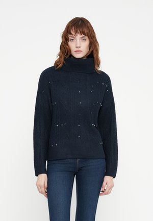 Marine gebreide trui met hoge kraag, voorzien van ruitpatronen en versierd met verspreide metallic accenten. Zachte, gestructureerde stof.