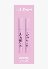 Tubi di mascara duali rosa etichettati "Occhi Accattivanti" e "Curva Lunghezza Definizione" su uno sfondo rosa coordinato, con "DOUBLE CATCH" in fondo.