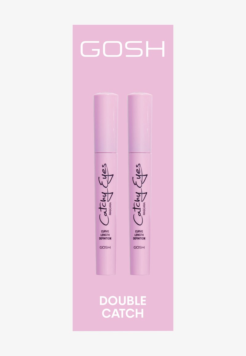 Tubi di mascara duali rosa etichettati "Occhi Accattivanti" e "Curva Lunghezza Definizione" su uno sfondo rosa coordinato, con "DOUBLE CATCH" in fondo.