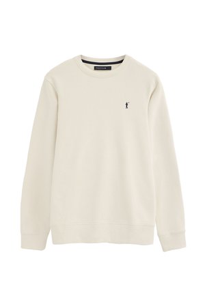 Felpa a maniche lunghe color crema con collo rotondo, piccolo logo di un giocatore di polo nero sul lato sinistro del petto e polsini e orlo a costine.