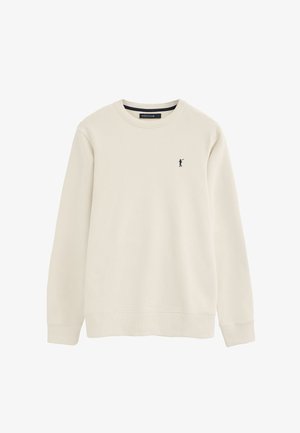 Sweat-shirt crème à manches longues avec col rond, petit logo de joueur de polo noir sur le côté gauche de la poitrine, poignets et ourlet côtelés.