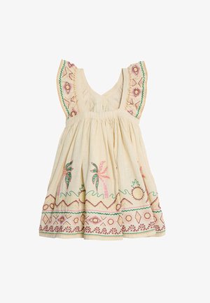 Světle krémové bavlněné šaty s volánovými ramínky, zdobené barevným květinovým a geometrickým vyšíváním podél lemu a živůtku.