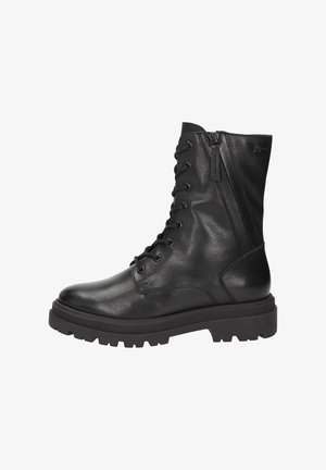 Zwarte leren combatboot met een vetersluiting aan de voorkant, een zijrits, een chunky zool en een gestructureerde afwerking. Geschikt voor robuuste outfits.