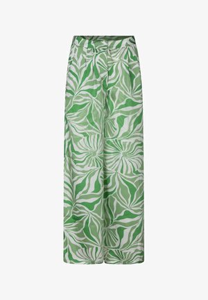 Pantalon large vert en tissu léger et lisse, orné d'un motif de feuilles dans des nuances de vert et de blanc.