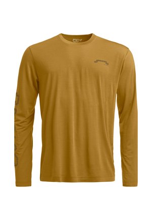 Langärmliges Hemd in Senfgelb, aus weichem Material gefertigt. Mit einem dezenten Grafikdesign auf der Brust und einem Muster entlang des Ärmels.