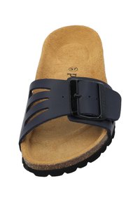 Navy slide sandal with cork footbed, textured surface, wide strap featuring cutouts, and adjustable black buckle on a rubber sole.