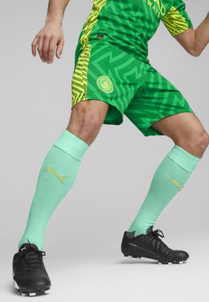 Puma MANCHESTER CITY TORWART- - Pantaloncini sportivi - grassy green yellow alert