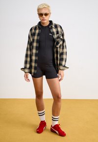 Puma DARE TO ONESIE - Kombinezon - black