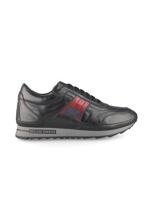 Black leather sneaker with red side stripes, black laces, gray sole, and Galizio Torresi branding on the sole and side patch.