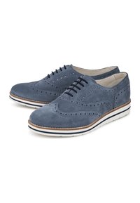 Suede lace-up shoes in dark blue with perforated detailing, white and brown sole, and rounded toe. Features classic brogue styling.