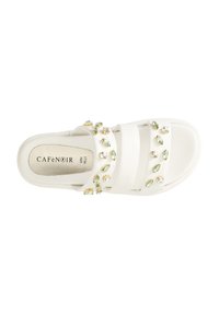 White slip-on sandal with three wide straps, adorned with clear and green rhinestones. Smooth material with a cushioned footbed.