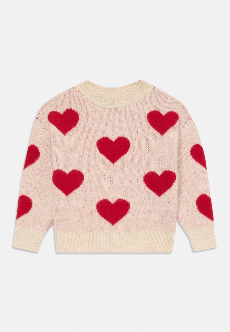 Πλεκτό πουλόβερ σε ανοιχτό ροζ με μεγάλα κόκκινα σχέδια καρδιάς. Διαθέτει στρογγυλή λαιμόκοψη και κρεμ ριμπ μανσέτες και στρίφωμα. Μαλακή υφή.