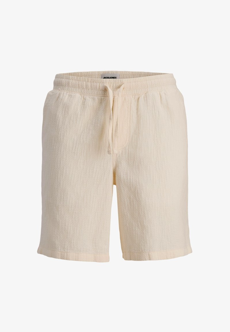 Shorts couleur crème en tissu texturé, dotés d'une taille élastique avec cordon de serrage, coupe droite avec bords ourlés.