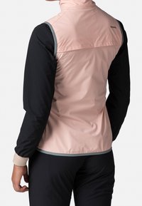 Leichte zweifarbige Jacke mit oberem Teil in Pink und unterem Teil in Schwarz, ausgestattet mit einem hohen Kragen, elastischen Bündchen und einem eleganten Design.