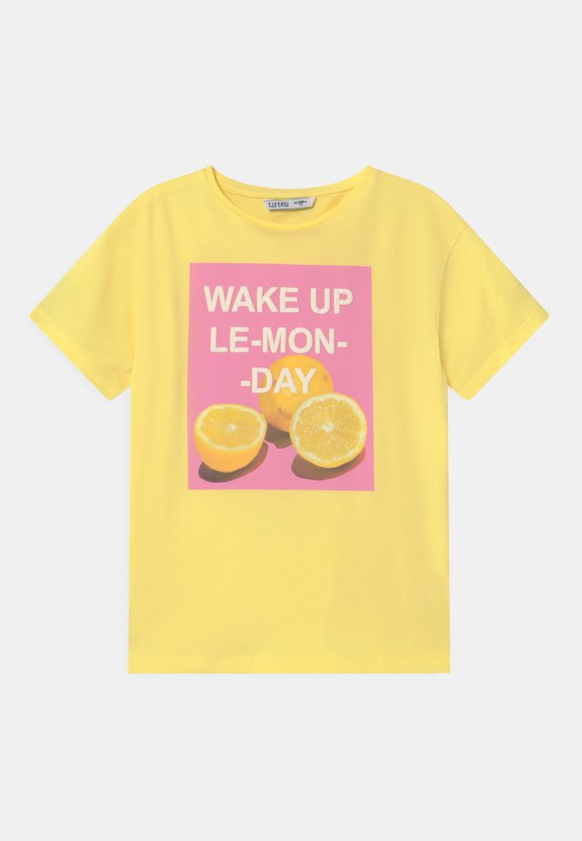 KRISTEL - Printtipaita - yellow