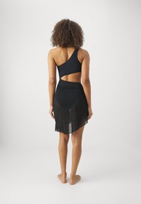 Hunkemöller SOLANGE RUFFLE - Doplnky na pláž - black