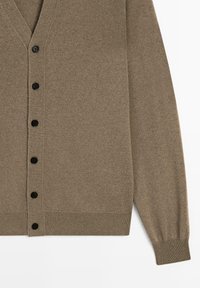 Khaki cardigan made from a soft knit fabric, featuring a V-neck, eight black buttons down the front, and ribbed cuffs and hem.
