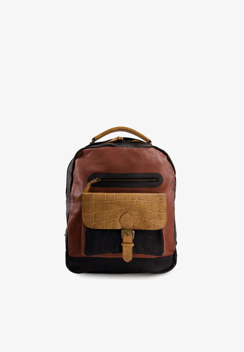 Leather backpack featuring brown and black panels, a textured tan front pocket, zip closure, and a carrying handle.