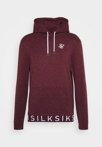 Felpa con cappuccio bordeaux maculata con cordini bianchi, piccolo logo bianco sul petto e scritta bianca con marchio lungo l'orlo inferiore.