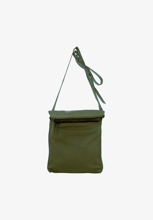 Small olive green leather shoulder bag with front zipper pocket and adjustable strap tied in a bow.