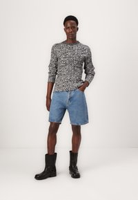 RASMUSSLIMMELANGE-Džemperis-black