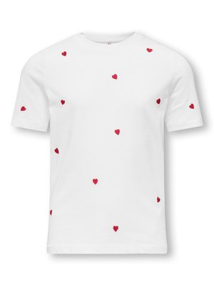 White short-sleeve T-shirt with scattered small red heart patterns across the front and sleeves.