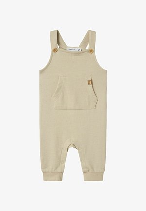 Beige geripptes Bodysuit mit verstellbaren Trägern, Holzknöpfen, einer Vordertasche und Druckknöpfen am Boden für einfaches An- und Ausziehen.