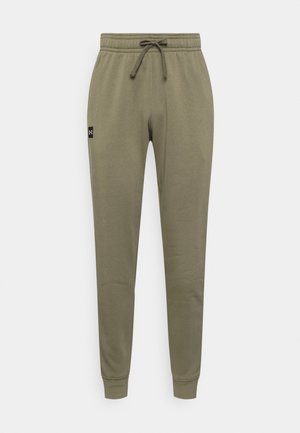 Olivově zelené tepláky z měkké látky, s elastickým pasem na šňůrku, zúženými nohavicemi a malou nášivkou s logem.