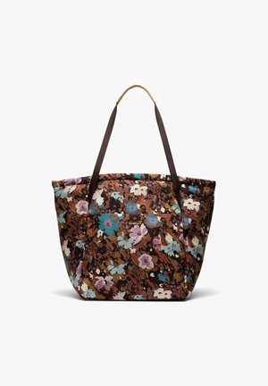 Sac fourre-tout floral avec un fond brun, présentant des fleurs turquoise, violettes et blanches, de solides anses brunes et un logo de marque subtil.