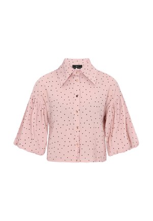 Pink button-up shirt with black polka dots, featuring puffed short sleeves and a collared neckline. Made of lightweight fabric.