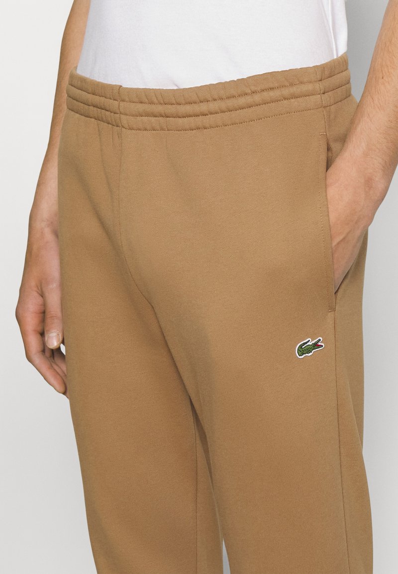 Lacoste Tracksuit bottoms cookie/sand