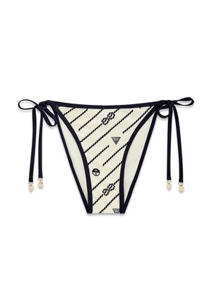 Donji dio bikinija bijelo-crne pruge s bočnim vrpcama za vezanje, mornarskim uzorkom užeta i malim logotipima na tkanini.