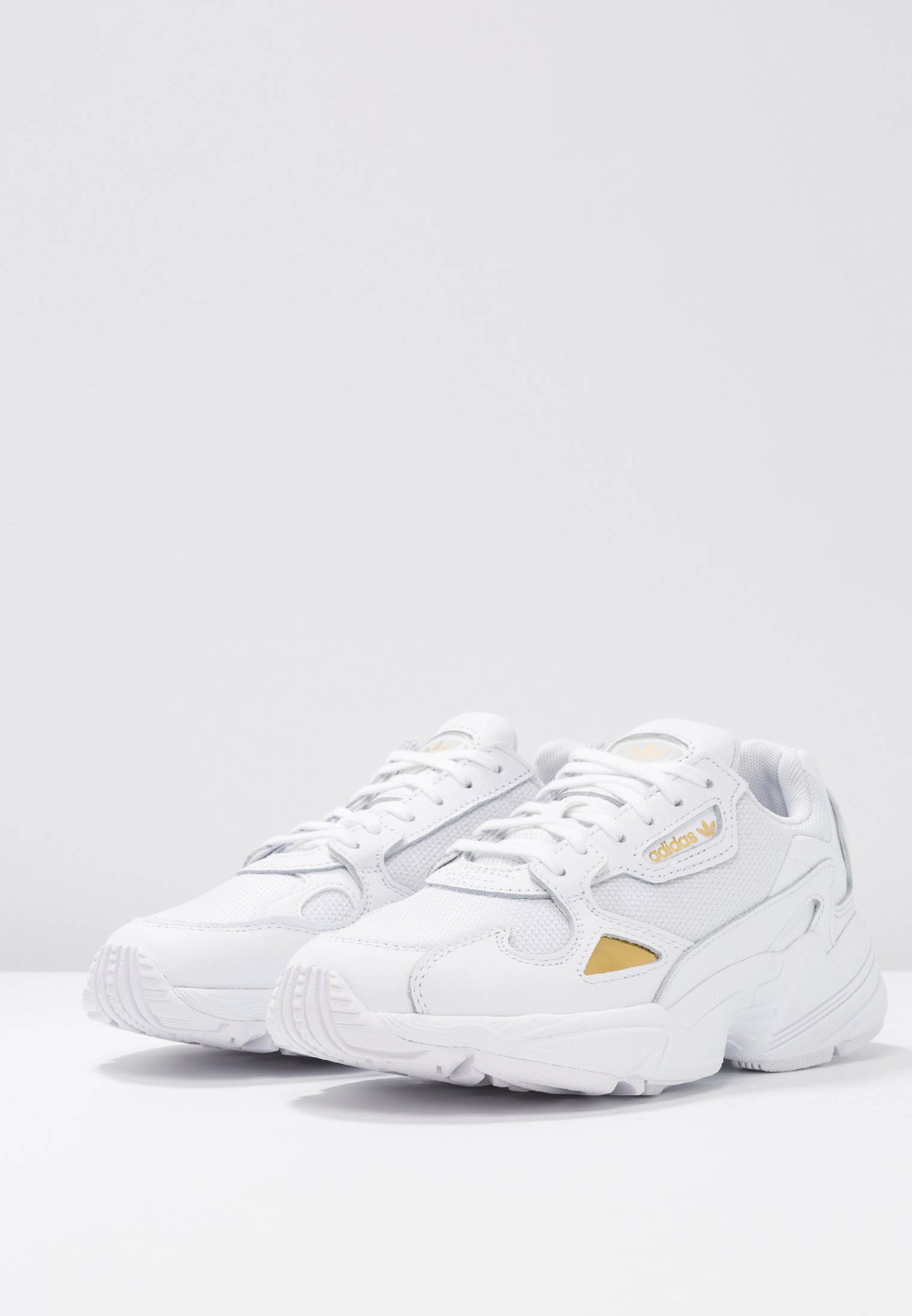 adidas originals gold metallic falcon trainers