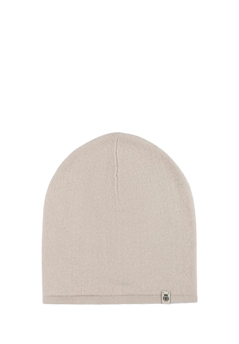 Light beige knitted beanie hat with a smooth texture, close-fitting design, and a small logo tag on the hem.