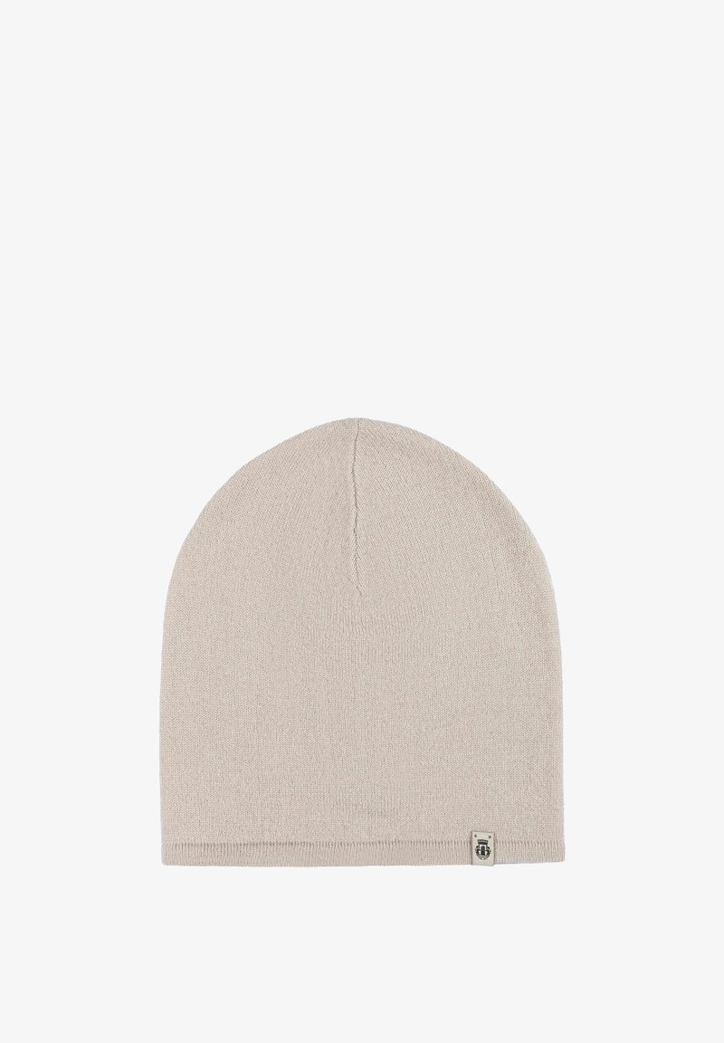 Light beige knitted beanie hat with a smooth texture, close-fitting design, and a small logo tag on the hem.