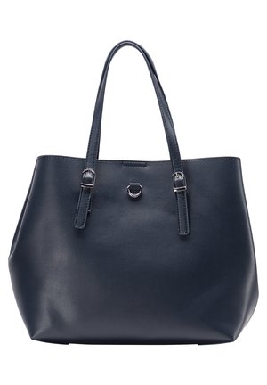 Dunkelblaue Ledertasche mit zwei verstellbaren Schulterriemen und einem kleinen silbernen Ringdetail vorne.