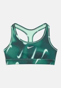 Sötétzöld sportmelltartó geometriai mintával, racerback dizájnnal és kontrasztos világoszöld szegéllyel. Kis fehér logó elöl.