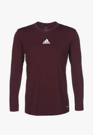 Bordeauxfarbenes Adidas Langarm-Sportshirt mit V-Ausschnitt und weißem Adidas-Logo in der Mitte der Brust.