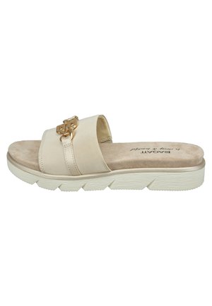 Beige slide sandal with a smooth synthetic upper, featuring a gold decorative accent and a textured white outsole. Soft inner lining.
