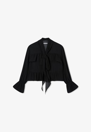 Blusa nera con chiusura frontale a fiocco, caratterizzata da dettagli a volant a strati, maniche lunghe con polsini svasati e un tessuto morbido e leggero.