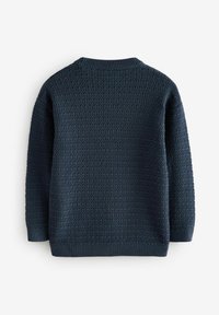 Maglione lavorato a maglia blu navy con un motivo testurizzato a nido d'ape. Collo a giro in costina, maniche lunghe e polsini con una finitura morbida.