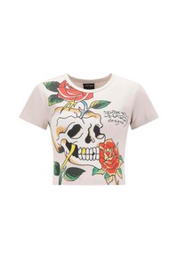 Afskåret t-shirt i lys beige bomuld med skull og rose grafik, der har livlige farver og fede sorte konturer. Korte ærmer og rund hals.