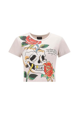 Korte mouwen T-shirt in lichtbeige katoen met een afbeelding van een schedel en een roos, met levendige kleuren en in het zwart omrande lijnen. Korte mouwen en ronde hals.