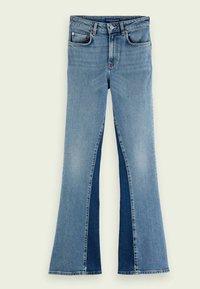 Ljusblå denimmed byxor med utställda ben och en mörkblå panel på utsidan. Femficksdesign och kontrasterande sömnadsdetaljer.
