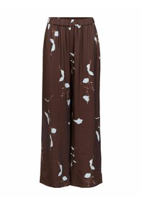 Pantalon large marron en tissu léger, arborant un motif floral avec des feuilles bleu clair et une ceinture élastique.